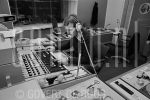 22-01-1976 Willem van Beusekom at radio studio in Hilversum.

[keywords]Black & White Image, Half Length, Radio studio, Headset[/keywords]